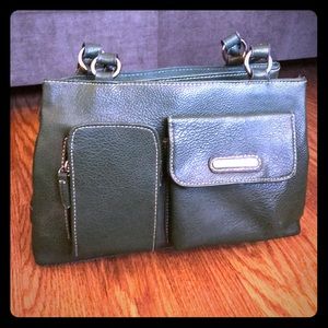 Barely used Rosetti forest green faux leather bag